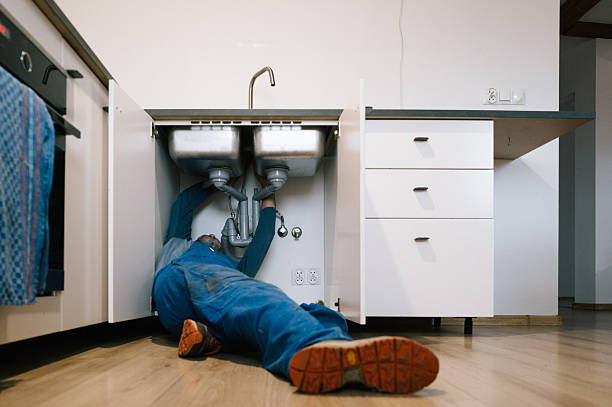Professional Drain Cleaning technician working in Meredith, NH